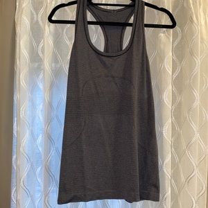 Lululemon Swiftly Tank in grey stripe. Size 10